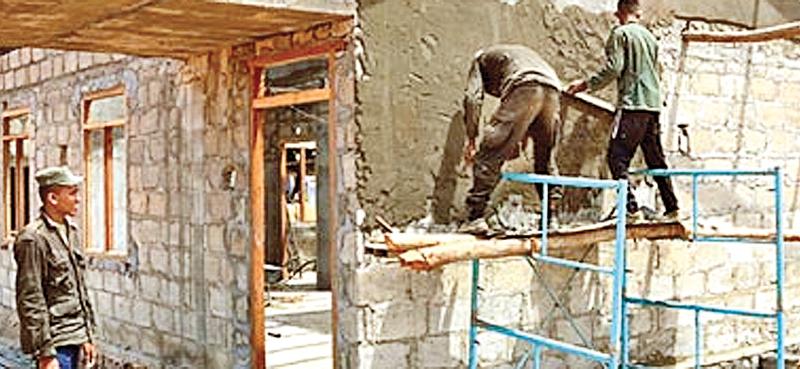 Houses for the displaced being built by the Army