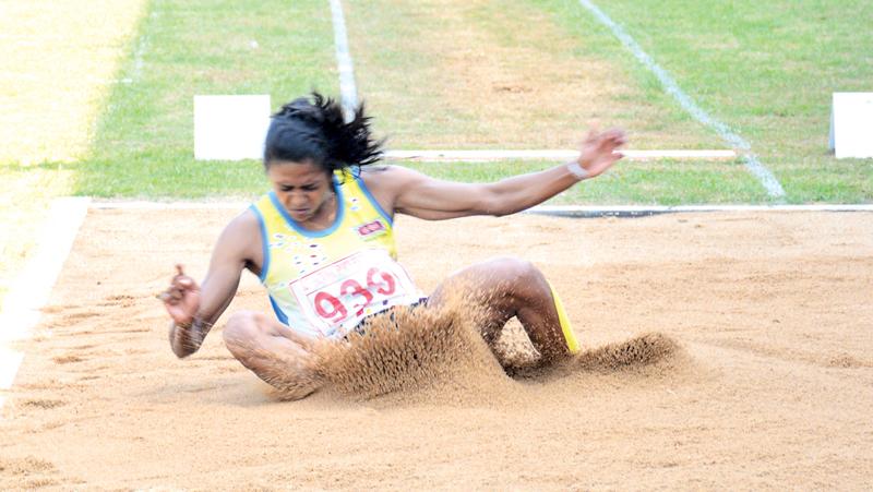 A.U.K. Sulawansa who cleared a distance of 6.04m to win the women’s long jump in action  Pic: Ranjith Asanka