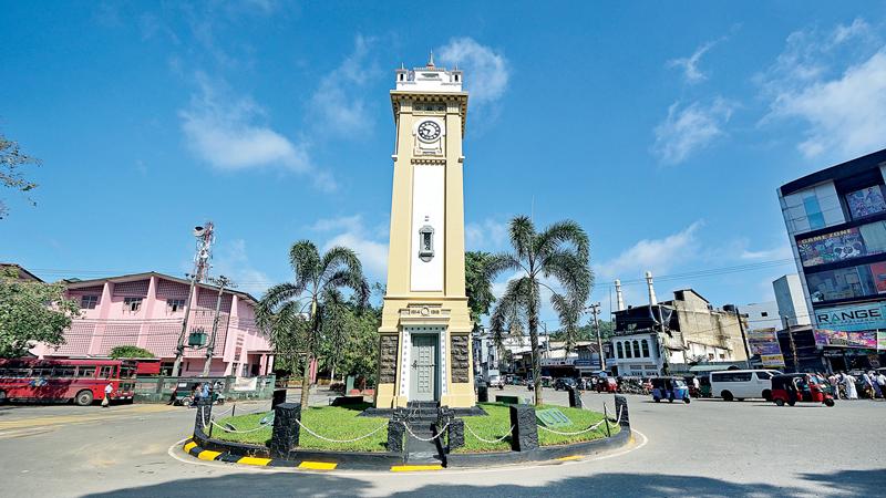 STILL IMPOSING: A century old magnificent clock tower stands in the heart of the town   