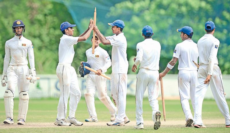 Sri Lanka celebrate their victory over Bangladesh in the second 4-day under 19 cricket test at Katunayake on Friday