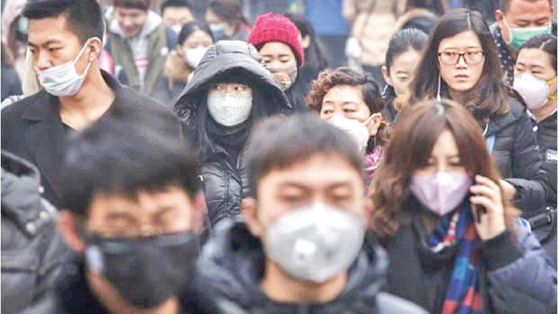 Air pollution in China is three times above World Health Organisation limits. Pic: Kevin Frayer/Getty Images