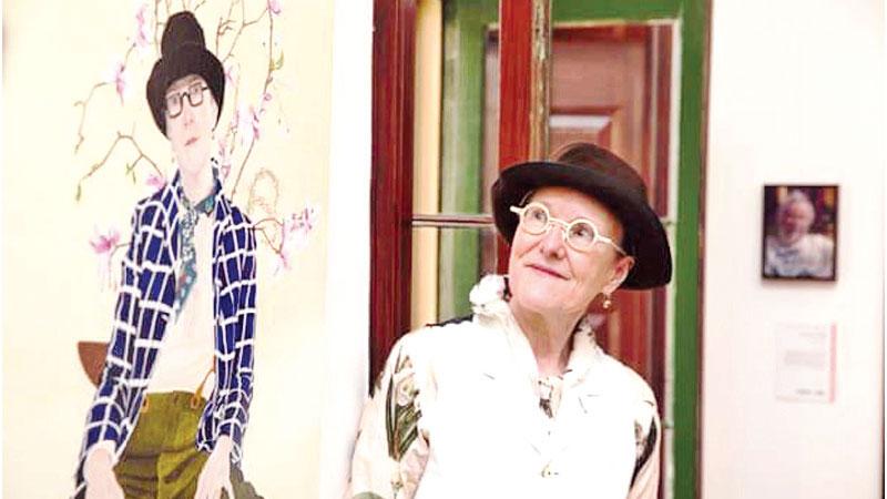  Lynn Savery with her Doug Moran prize-winning self-portrait.  Pic: Carly Earl for the Guardian