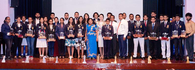 Award winners with the chief guest at the 20th anniversary celebrations of AKCC. From left:-Ashvini Pavalachandran (Wicherly), WFM Pevinya Peiris, (Vishaka), WCM- G.P.Y. Wijesuriya (Visakha), WCM Sayuni Gihansa Jayaweera, (Dharmasoka), Dineth Silva - Manager - Prime Lands, Kanishka Udagedara (Mahamaya), Chamika Withanage (NI - LCAI Pvt Ltd), WFM – Dilhara Wickramasinghe (Musaeus), Pulsara Gunawardana, (SriLankan Airlines), M.M.S. Thilini Anoratna, (Bank of Ceylon), WFM Pramodya Senanayake, (Mobitel), Malint
