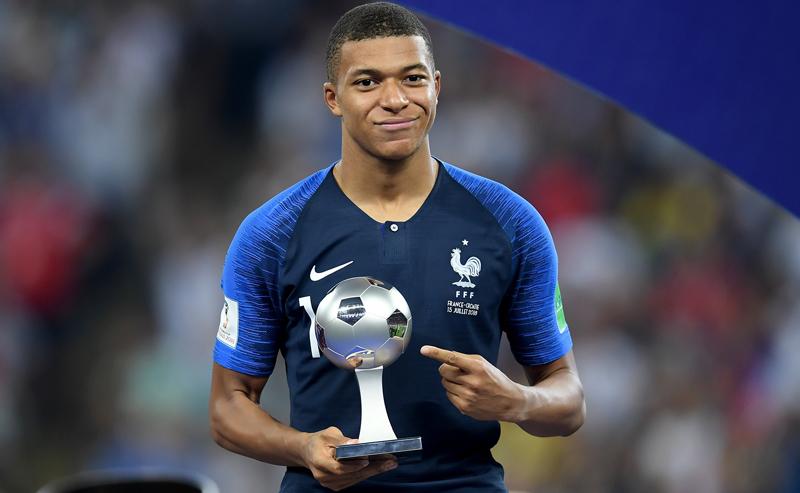 Kylian Mbappe of France with his Best Young Player Award  (Photo by Matthias Hangst/Getty Images)