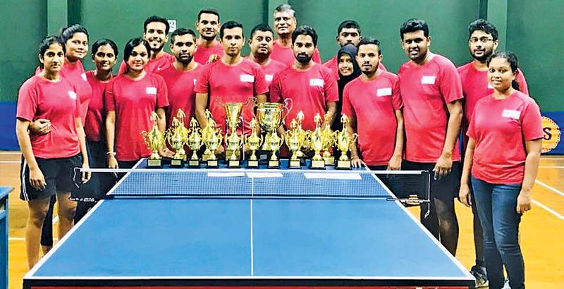 MAS Holdings men and women table tennis teams after emerging champions (from left): Ruwini Gunawardena, Kalpani Herath, Upeka Kotinkaduwa, Dulanjalee Samarasinghe, Niroshan Weerasooriya, Jayampathi Ratnayake, Akil Thirimanna, Pulasthi Alwis, Rajiva Wijetunga, Susantha Nugawela, Chathura Weerakoon, Raiza Amanulla, Gimhana Walisundara, Sukitha Wickramanayake, Nisansala Dilrukshi, Sachira Malimbadage, Praneeth Weerasekara, Harindu Kariyawasam