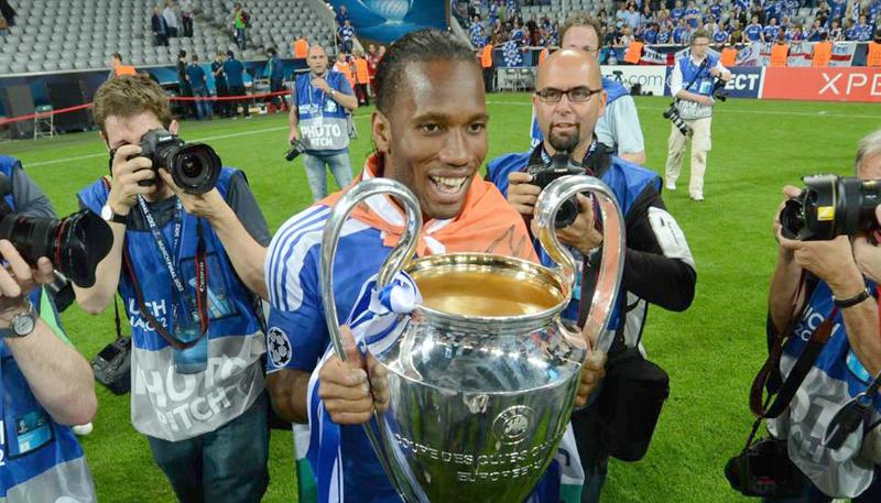 Didier Drogba with one of his trophies