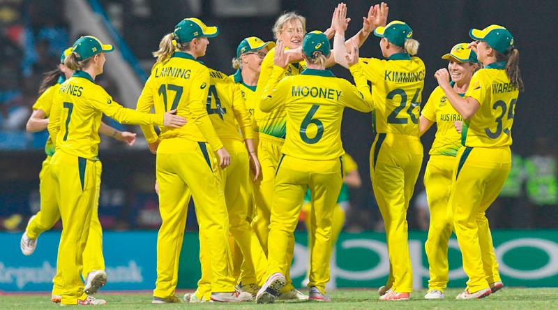 Australia’s women celebrate their entry into the World T20 final ( AFP)
