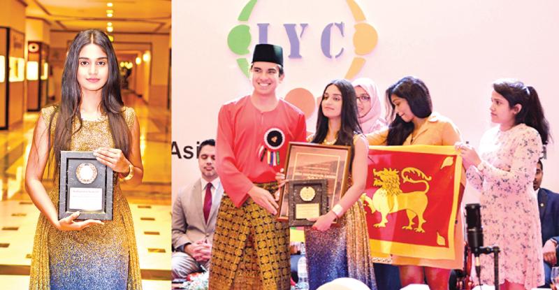 Popular teledrama actress Michelle Dilhara receiving the Asia Inspiration Award 2018, from Syed Saddiq Syed Abdul Rahman, Minister of Youth  and  Sports, Government of Malaysia.
