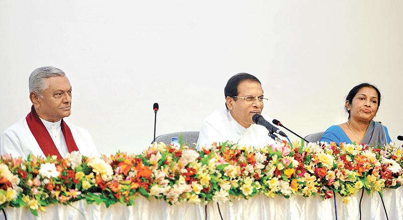 President Maithripala Sirisena addresses Health Ministry officials   while  parliamentarian Chamal Rajapaksa and Health Ministry SecretaryWasantha Perera look on.   