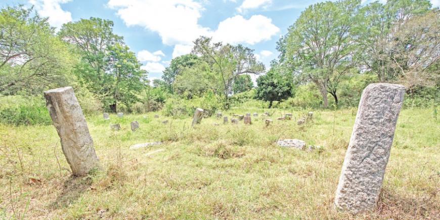 Imposing ruins of ancient stone pillars scattered across the Galtemmandiya archaeological site   