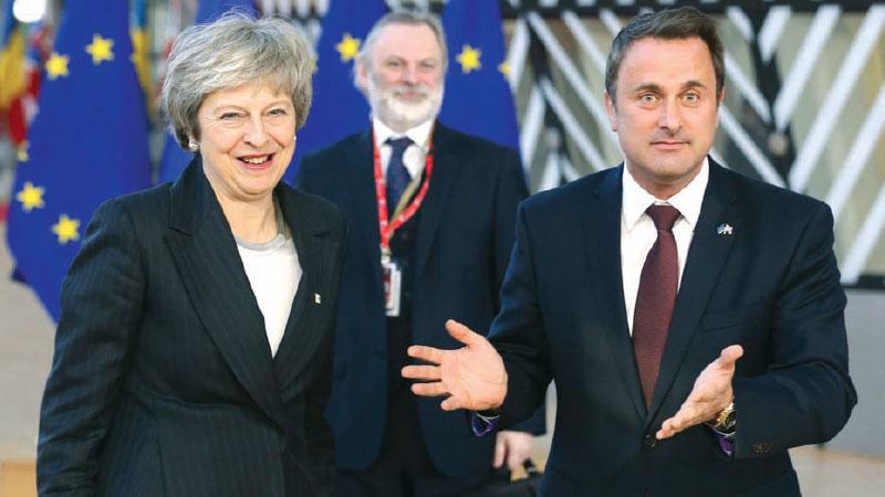Luxembourg’s Prime Minister, Xavier Bettel (R), said EU leaders know what Theresa May (L) wants, ‘the problem is the MPs in London’. Pic: Xinhua/Rex/Shutterstock    