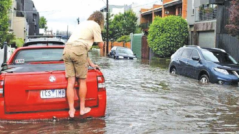 Glass Street in Richmond floods after heavy rains. Pic: News Corp Australia    