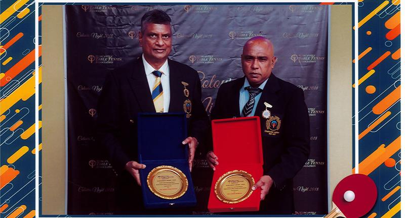 Wijetunge (left) and Moraes posing with their awards   