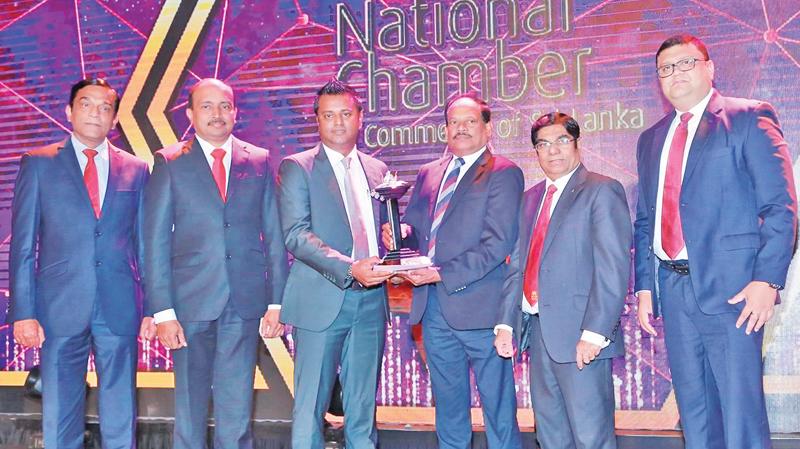 Browns Group Chief Operating Officer Danesh Abeyratne (third from left) receives the award, and Group Chief Financial Officer T. Sanakan, Chief Process Officer C.N. Rathakrishnan and Senior Vice President, Group Human Resources, Paduma Subasinghe look on.