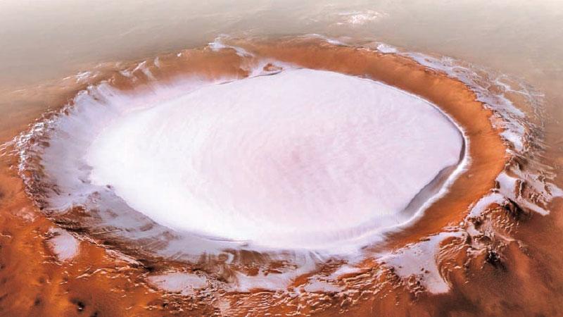 The Korolev crater in the northern lowlands of Mars. This view was generated using a digital terrain model and Mars Express data. Pic: Björn Schreiner/FU Berlin/DLR/ESA