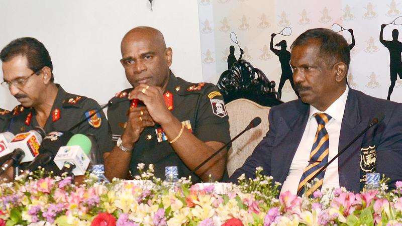 Army commander Lt. General Mahesh Senanayake (centre) speaks to the media on their future plans. Others in the picture are Lt. General Jagath Gunawardena (left) president of Army Sports and Air Commodore (Rtd) Ajith Abeysekera (right) president of Sri Lanka Squash.   Picture by Wimal Karunathilake   