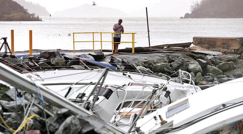 Cyclone damage at Shute Harbour in Queensland, Australia. Recent reports have shown the dangers of extreme weather if warming reaches 1.5C
