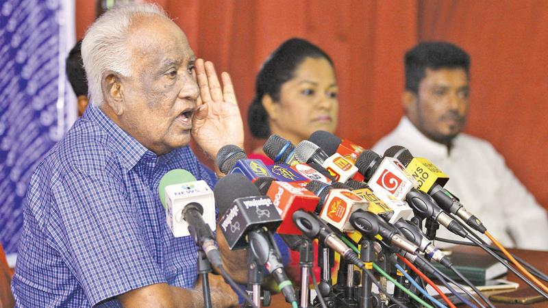 Former Kaduwela Mayor G.H.Buddadasa speaking at the press conference by rebelling SLFP organisers, who protested against the SLFP-SLPP tie up. Pic by Hirantha Gunathilaka