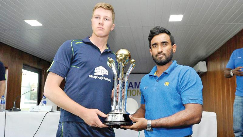 Ireland A captain Harry Tector (left) and his Sri Lankan counterpart Ashan Priyanjan hold the trophy they will play for