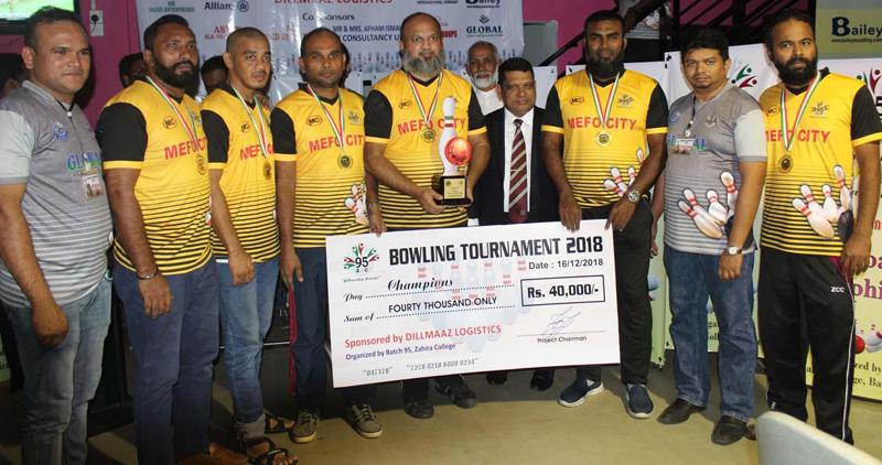 The champions from left: Naveez Marzook (president Batch 95), Azmeer Mohideen, Tuan Manan, M. Shafraz, Atheek Haniffa (captain), Trizviiy Marikkar (principal Zahira College), Mihan Thoufeek, Fayaz Mooseen (Project Chairman) and Azmi Anvert    