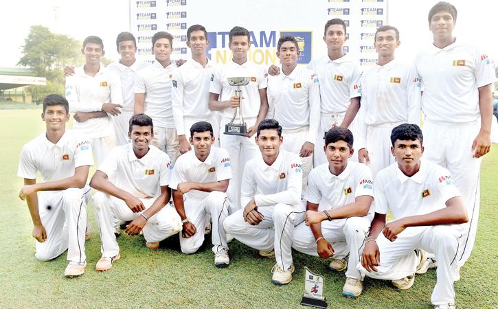 The Sri Lanka Under 19 squad comprising Nipun Perera (captain), Navod Paranavithana, Kamil Mishara, Sonal Dinusha, Mohammed Shamaz, Raveen de Silva, Thaveesha Abishek, Avishka Tharindu, Lakshan Gamage, Chamindu Wijesinghe, Praveen de Silva, Dilshan Madusanka, Ashain Daniel, Rohan Sanjaya and Dilum Sudeera pose with their trophy after beating Australia