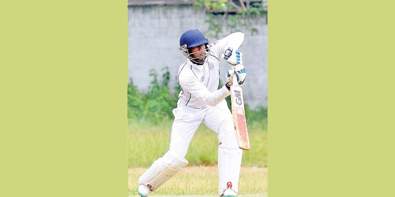Wesley College batsman Kavindana Perera drives a ball (Picture by Saman Mendia)