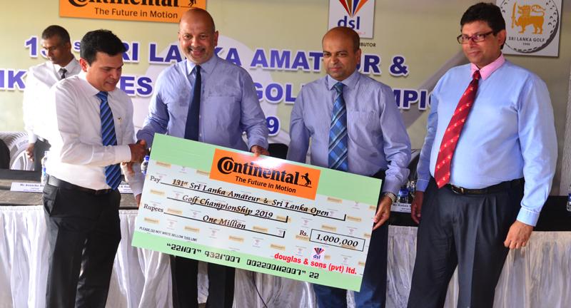 Air Chief Marshal Harsha Abeywickrema receiving the sponsorship cheque from Dammika Jayaweera (left) GM Tyres.     