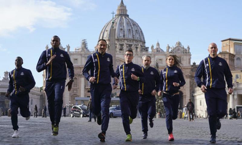 Members of the Vatican athletics team on the run 