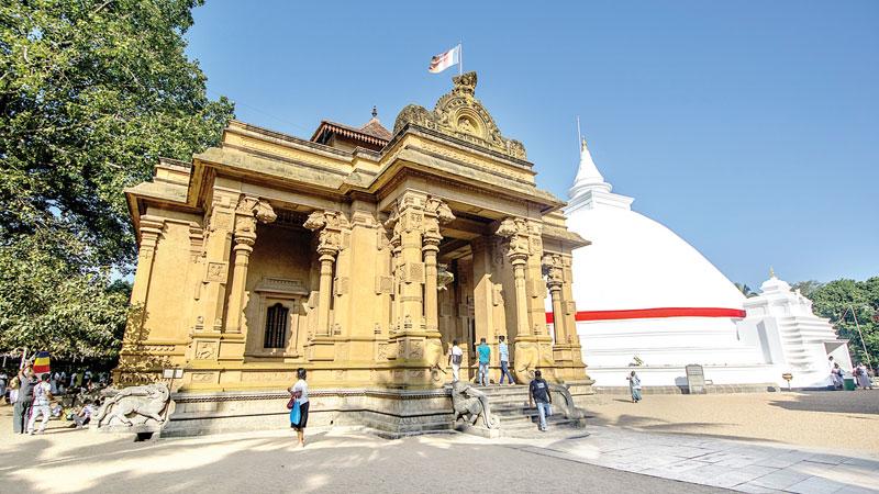 ARCHITECTURAL SHOWPIECE: The main temple building of Kelaniya and the large white dagoba