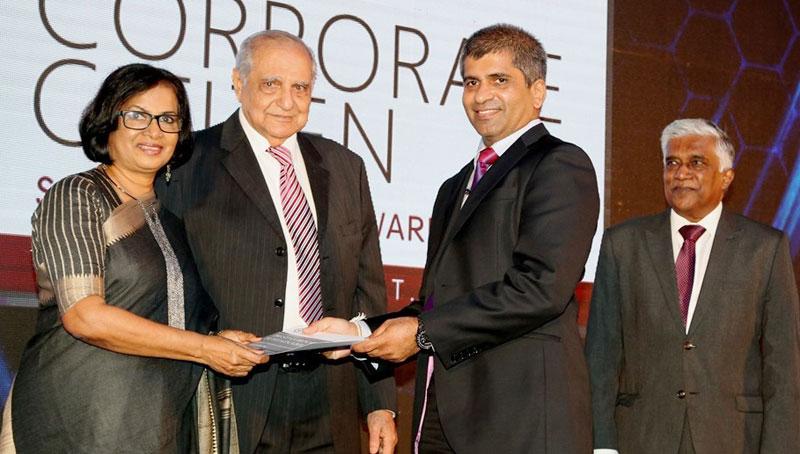 Senior DGM, PLC, Sanjeewa Bandaranayake receives the award for financial performance.   