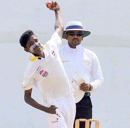 St. Peter’s College bowler Kanishka Maduwantha bowls during his 10-wicket haul in their match against St. Benedict’s College which ended in a draw at Kotahena yesterday (Pic by Saman Mendis)    