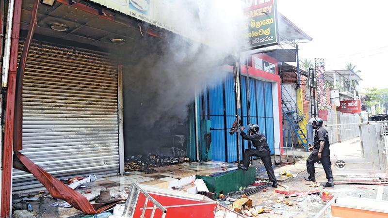 Violence in Digana last year. Pic: Lake House Media Library