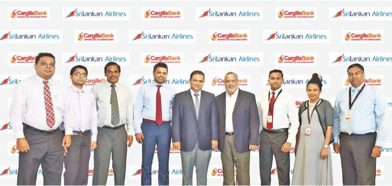 SriLankan Airlines team together with Cargills Bank team after signing the agreement.  