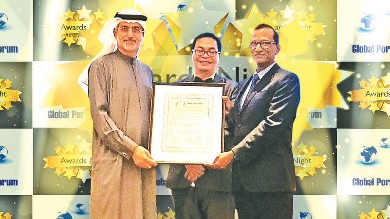 SAGT General Manager Operations, Upul Jinadasa  receives the award.