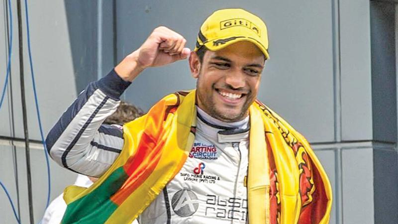 Eshan Pieris with the Sri Lanka flag