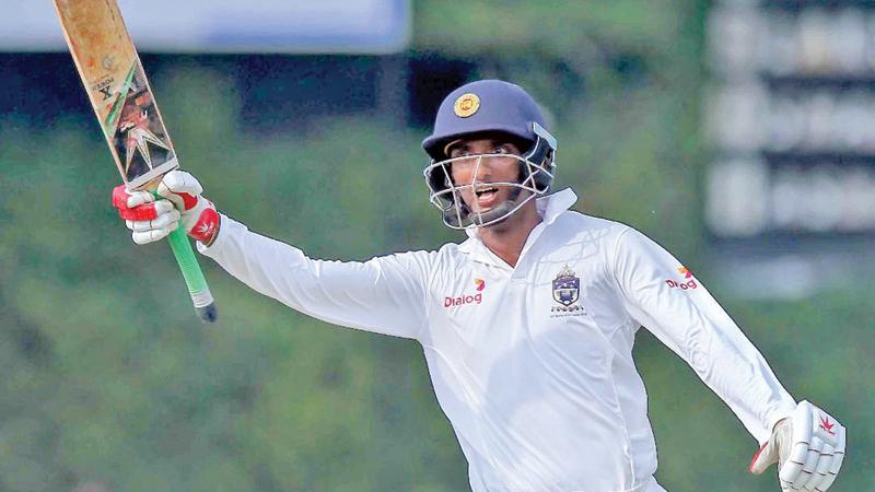 Santhush Gunatilleke celebrates his match-saving 161 Pic: Shan Rambukwella