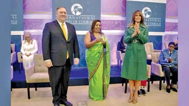 Marini de Livera with her award with Melania Trump and US Secretary of State Michael Pompeo