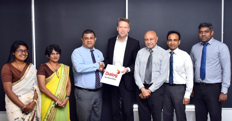 After the signing of the MoU. From left: Head, Computer Science, School of Computing, NIBM, Dr. Buddhima Subasinghe,  Director, School of Computing, NIBM, Gangani Wickramasinghe, Chairman, NIBM, Rohan Prithiviraj Perera, Vice President, Group Corporate Planning and Strategy, Dialog Axiata, Munesh David and Head, Business Intelligence Analytics, Dialog Axiata, Eranda Adikari.    