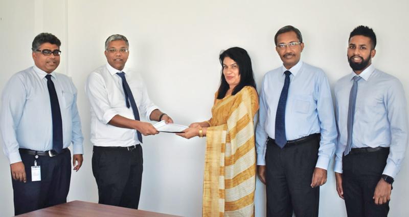 From left: Head of Marketing of HNBA and HNBGI Dinesh Yogaratnam, Managing Director/CEO of HNBA and HNBGI Deepthi Lokuarachchi, President of CCPSL Dr. Janaki Vidanapathirana, Chief Operating Officer of HNBA Prasantha Fernando and Asst. Manager - Life, PR and Digital Media after the signing of the MoU.