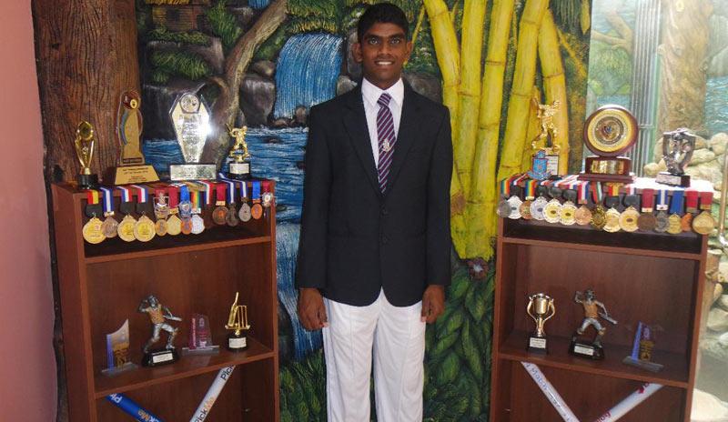 Sachintha Senanayake with his medals and trophies 