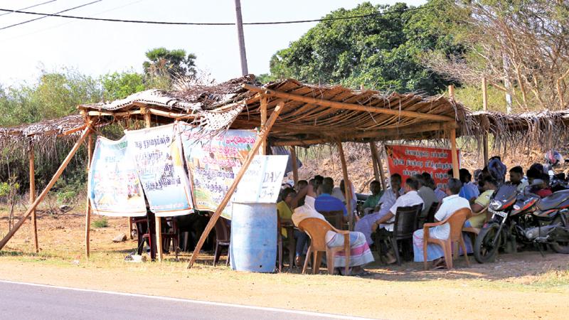 A sit-in protest in front of the Silavathurai Navy camp