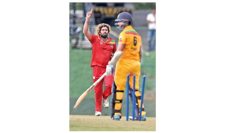 Lasith Malinga reacts after a wicket