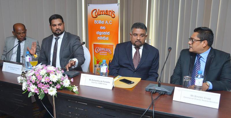 Reckitt Benckiser and CDDEF Group officials at the media briefing. Picture by Ranjith Asanka