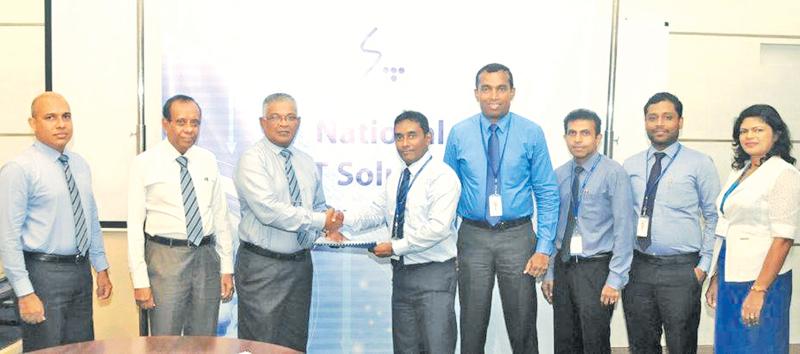 ICC and SLT officials at the signing of the agreement. From left: From ICC - Engineer Prasanna Alahakoon, Director Vajira Nagodavithana, CEO Namal Peiris. From SLT - Chief Sales and Regional Officer Imantha Wijekoon, General Manager Chethana Attanayake, Business Development Manager, Kelum Priyantha, Marketing Officer Sameera Ekanayake and Senior Executive Assistant Manager, Chithra Wijesooriya.  
