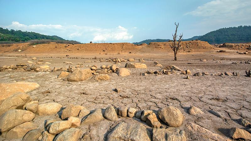 LONG VIEW: The parched landscape of the dried up reservoir bed of Samanalawewa in Balangoda   