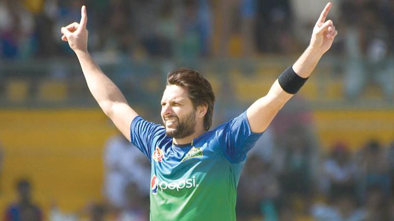 Afridi in his characteristic pose after taking a wicket