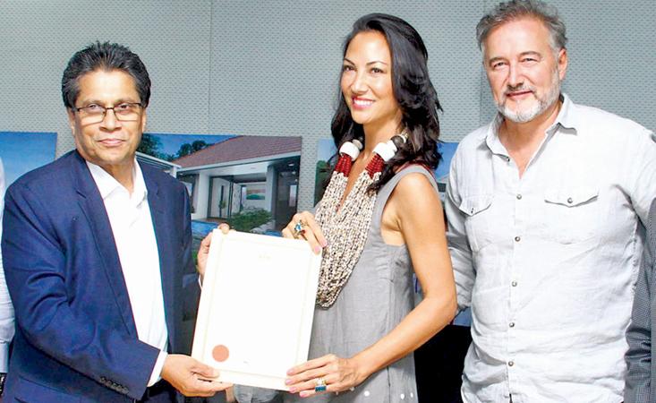 BOI Chairman Mangala Yapa with Dale Rennie and Sabrina Van Cleef Ault after the signing of the agreement.   Pic: Sulochana Gamage