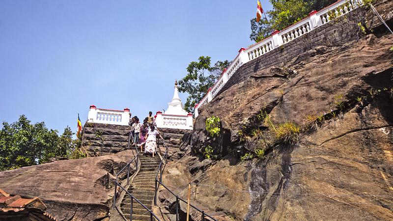    STEPS TO THE PAST: Glistering Dagoba occupies the highest place in rock boulder  