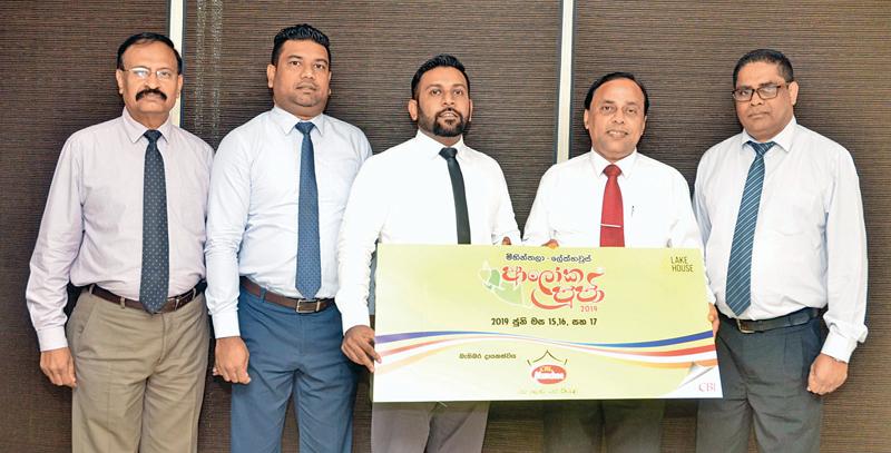 Ceylon Biscuits Limited, a co-sponsor for the 57th Mihintala Lake House Aloka Pooja organised by the Associated Newspapers of Ceylon Limited (ANCL), presented the sponsorship cheque to ANCL Deputy General Manager (Advertising) Waruna Mallawaarachchi at the CBL premises. Here, Mallawaarachchi receives the cheque from CBL General Manager (Marketing) Janmesh Paul Anthony. CBL Public Relations Manager Janaka Botheju, Assistant Marketing Manager Romesh Jayathilake and ANCL Deputy General Manager (Finance) Viraj