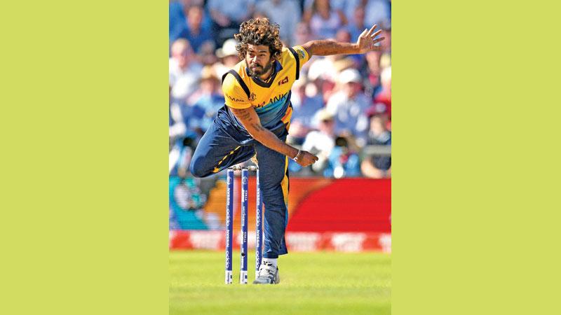 Lasith Malinga bowls during his four wicket haul (AFP)